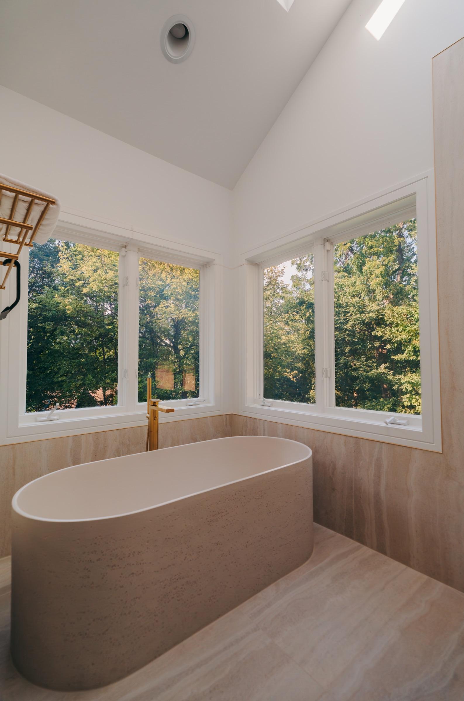 Primary bathroom windows — powered on, clear view
