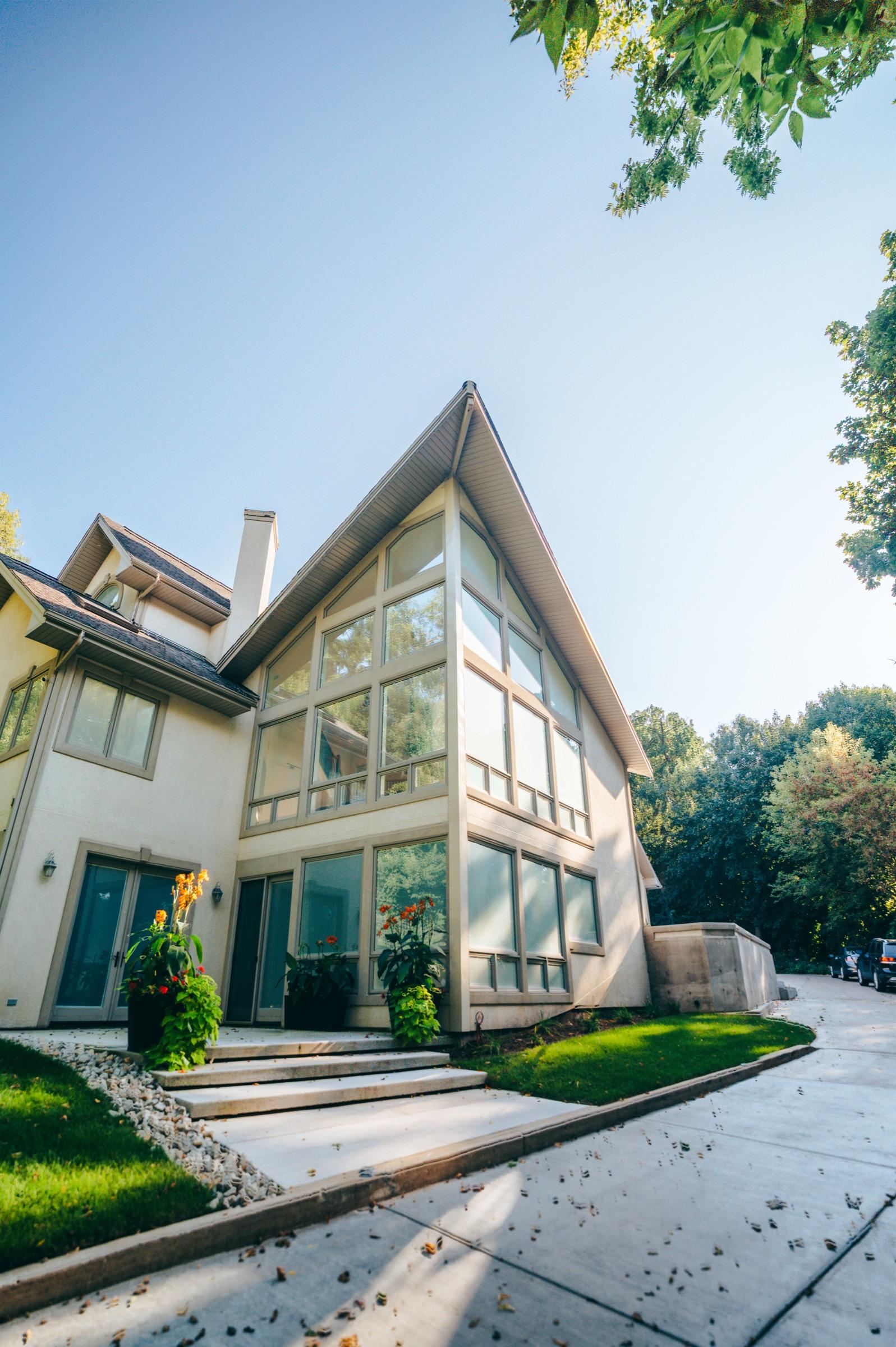 Full-height exterior glazing — switched to frosted