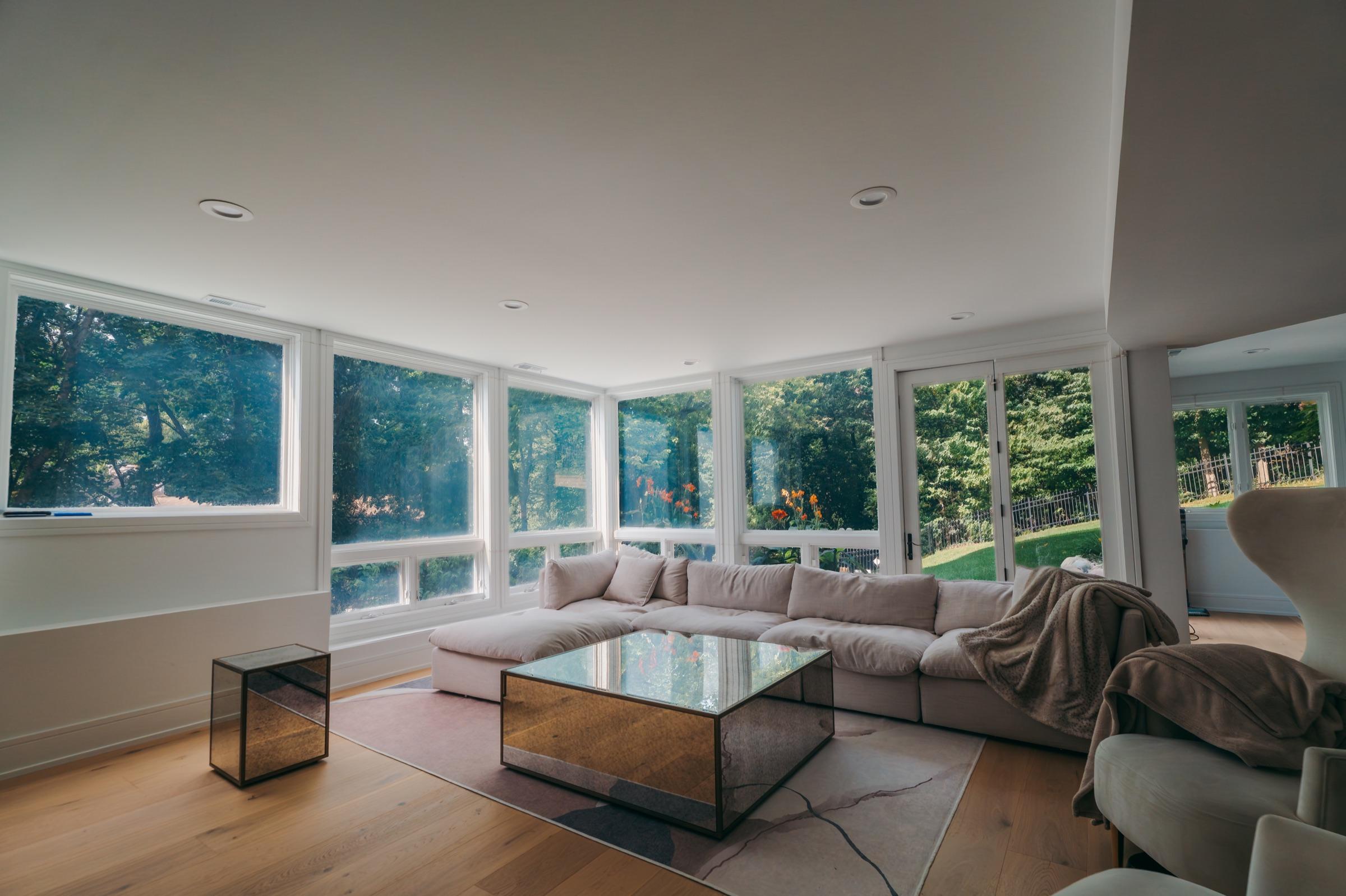 Bay window living room — powered on, fully transparent